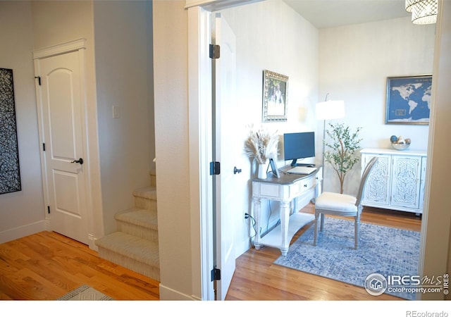 6523 Spanish Bay Dr, Windsor, CO 80550 - office area featuring wood finished floors and baseboards