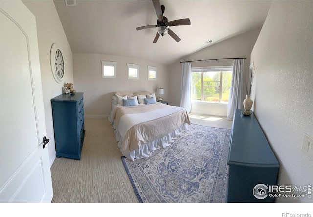 6523 Spanish Bay Dr, Windsor, CO 80550 - carpeted bedroom with lofted ceiling, baseboards, and ceiling fan