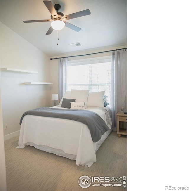 6523 Spanish Bay Dr, Windsor, CO 80550 - bedroom with carpet floors, vaulted ceiling, a ceiling fan, and baseboards