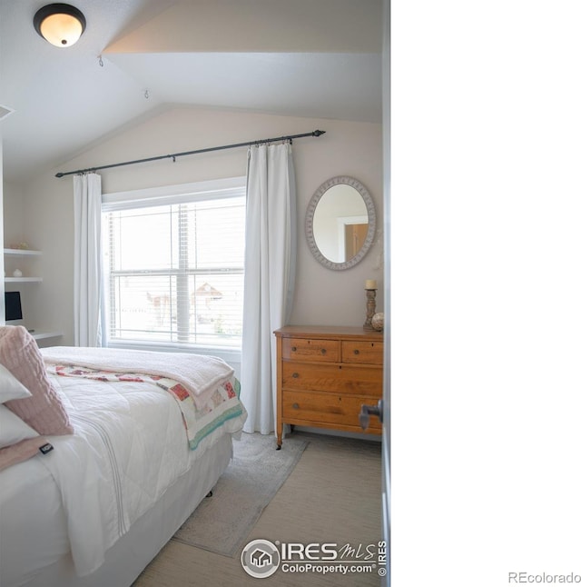 6523 Spanish Bay Dr, Windsor, CO 80550 - bedroom with lofted ceiling
