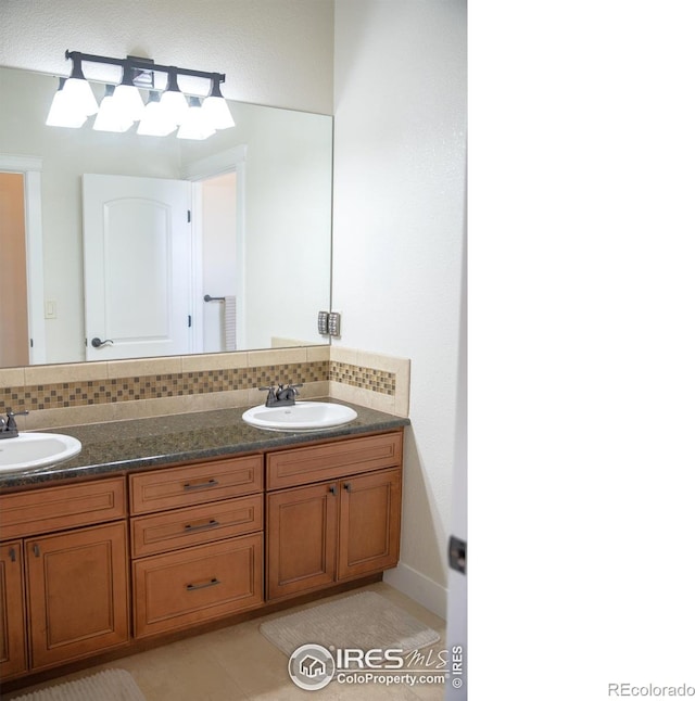 6523 Spanish Bay Dr, Windsor, CO 80550 - bathroom with double vanity