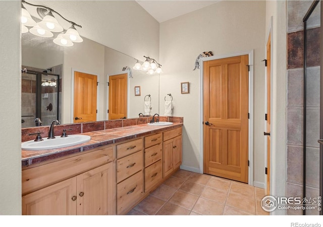 6535 Half Moon Bay Dr, Windsor, CO 80550 - full bath with a stall shower, double vanity, and tile patterned floors