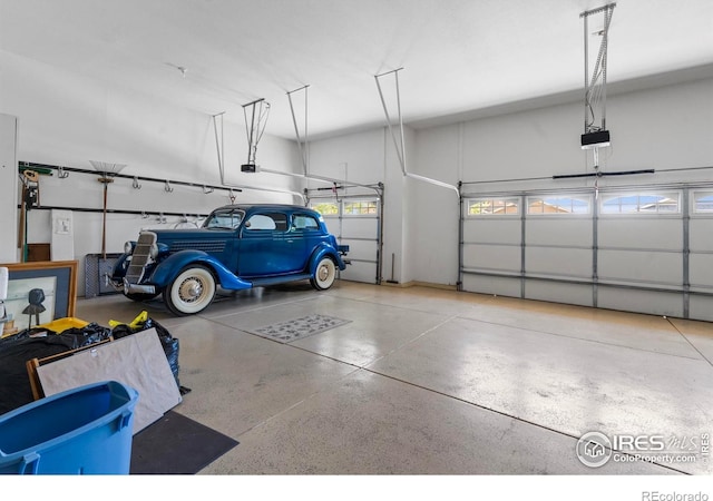 6535 Half Moon Bay Dr, Windsor, CO 80550 - garage with a garage door opener
