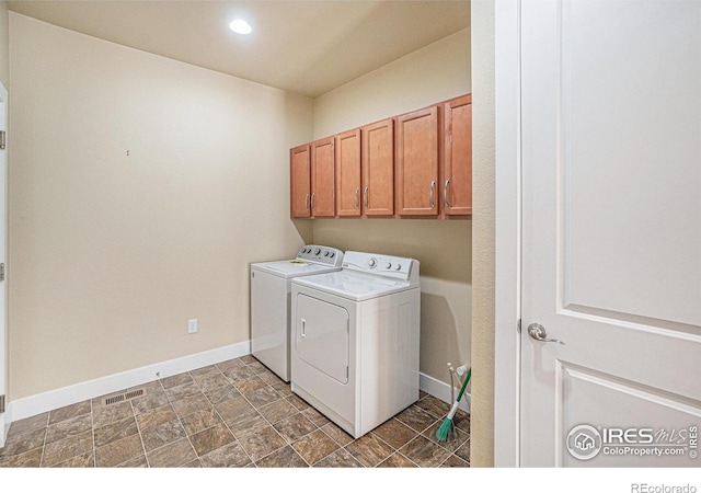 4751 Pleasant Oak Dr Unit B44, Fort Collins, CO 80525 - laundry room with washer and dryer, baseboards, recessed lighting, cabinet space, and stone finish floors