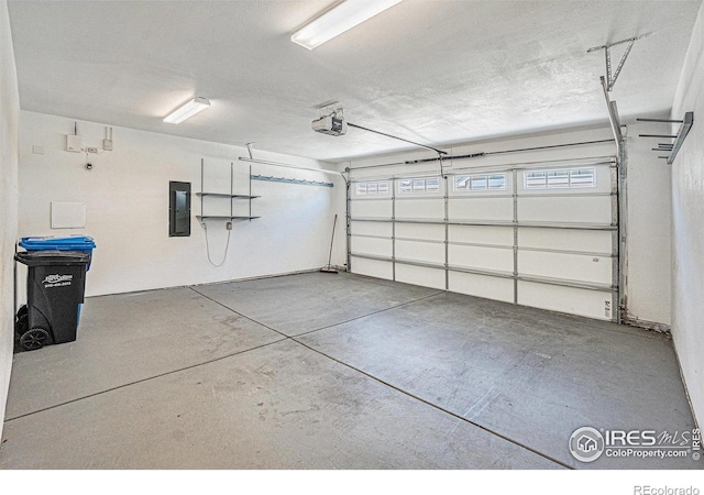 4751 Pleasant Oak Dr Unit B44, Fort Collins, CO 80525 - garage with a garage door opener and electric panel