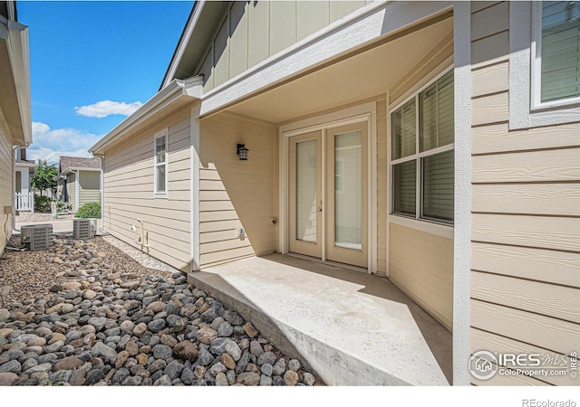 4751 Pleasant Oak Dr Unit B44, Fort Collins, CO 80525 - property entrance featuring central air condition unit and board and batten siding