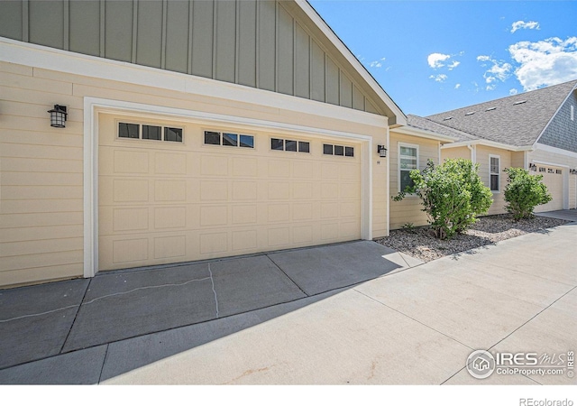 4751 Pleasant Oak Dr Unit B44, Fort Collins, CO 80525 - garage featuring driveway