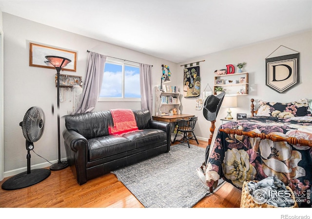 3412 Erving Ct, Berthoud, CO 80513 - bedroom with wood finished floors and baseboards