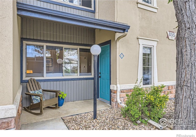 855 W Moorhead Cir Unit C, Boulder, CO 80305 - property entrance with stone siding and stucco siding