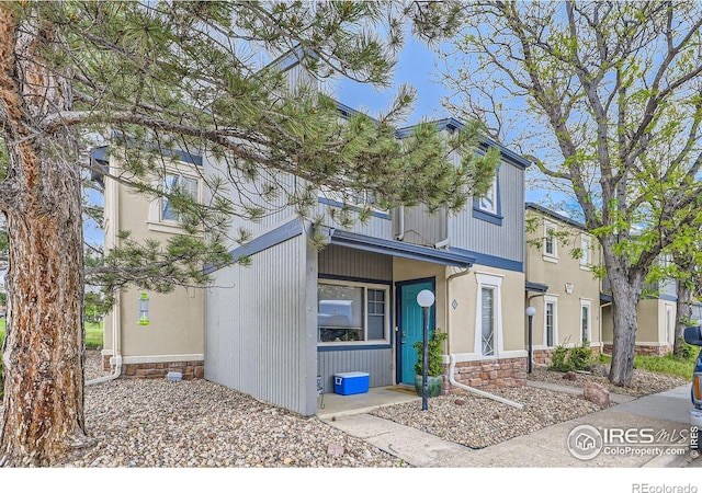 855 W Moorhead Cir Unit C, Boulder, CO 80305 - view of front of property featuring stone siding