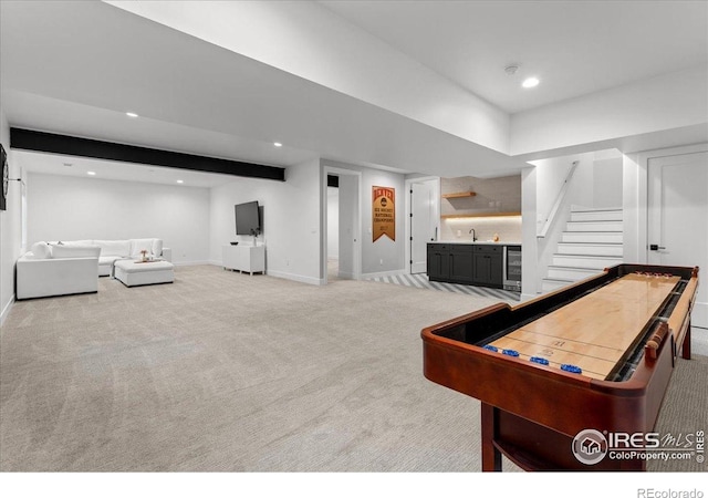 3256 S Corona St, Englewood, CO 80113 - game room with light colored carpet, bar with sink, recessed lighting, and beamed ceiling