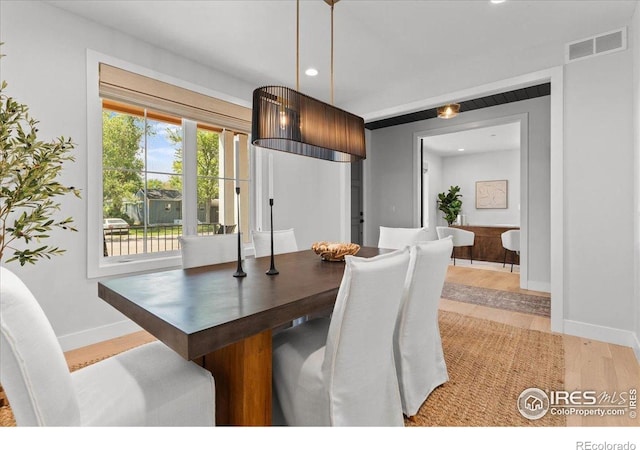 3256 S Corona St, Englewood, CO 80113 - dining space with light wood-type flooring and recessed lighting