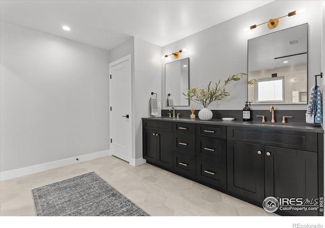 3256 S Corona St, Englewood, CO 80113 - bathroom with double vanity, recessed lighting, and tile patterned flooring