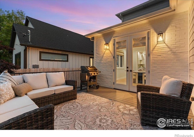 3256 S Corona St, Englewood, CO 80113 - deck featuring french doors, outdoor lounge area, and a grill