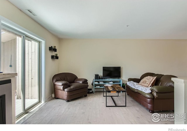 2938 Kalmia Ave Unit 26, Boulder, CO 80301 - living area featuring light wood-style floors and baseboards