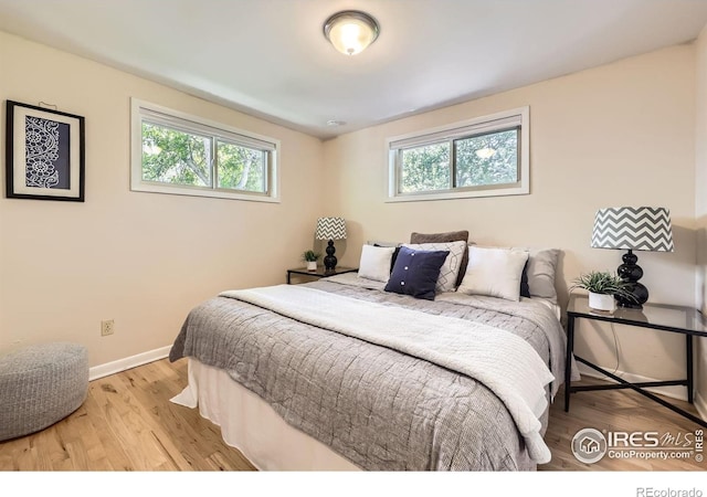 630 S 45th St, Boulder, CO 80305 - bedroom featuring baseboards and light wood-style flooring