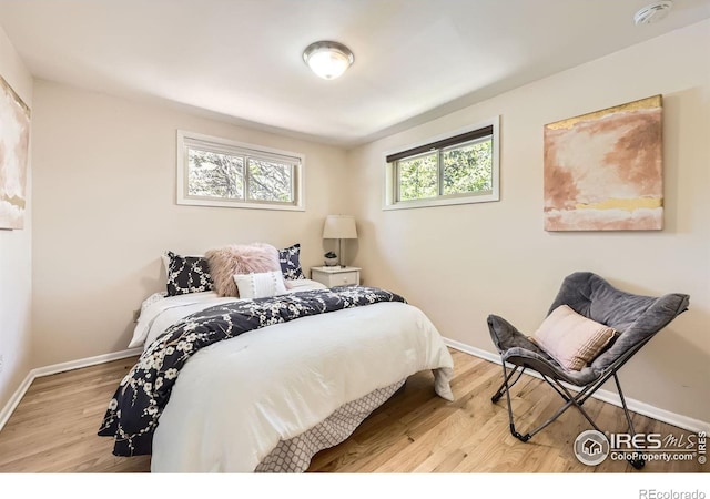 630 S 45th St, Boulder, CO 80305 - bedroom with baseboards and wood finished floors