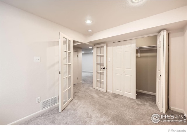 630 S 45th St, Boulder, CO 80305 - unfurnished bedroom with carpet flooring, french doors, baseboards, and recessed lighting