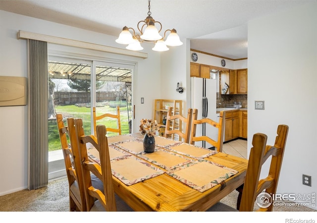 1542 Kilkenny St, Boulder, CO 80303 - dining space featuring a chandelier and light colored carpet