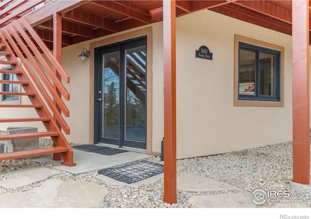 880 Hummer Dr, Nederland, CO 80466 - entrance to property featuring stucco siding