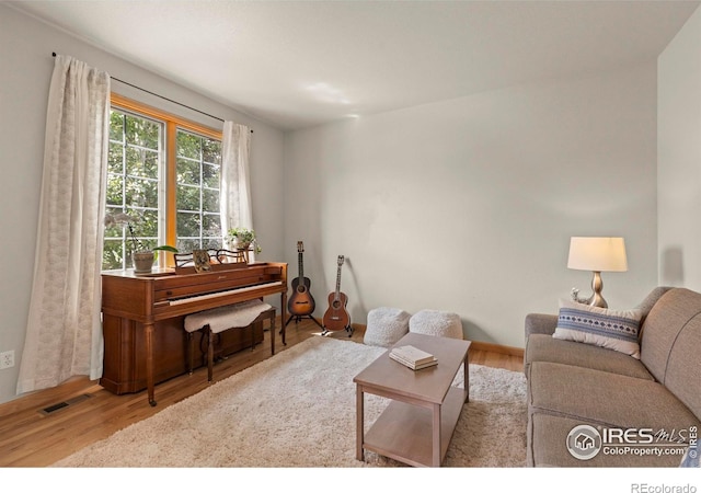 5751 Round Rock Ct, Fort Collins, CO 80528 - living room featuring wood finished floors and baseboards