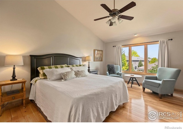 5751 Round Rock Ct, Fort Collins, CO 80528 - bedroom featuring light wood-style floors, lofted ceiling, and a ceiling fan