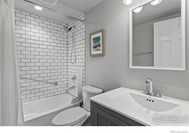 5751 Round Rock Ct, Fort Collins, CO 80528 - full bathroom with shower / bath combo, vanity, toilet, and a textured wall