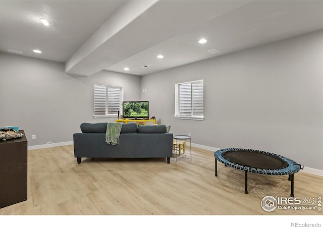 5751 Round Rock Ct, Fort Collins, CO 80528 - living room featuring light wood finished floors, baseboards, and recessed lighting