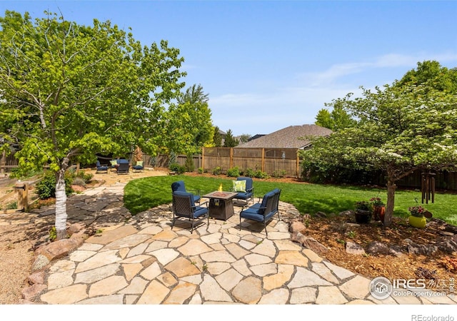 5751 Round Rock Ct, Fort Collins, CO 80528 - view of patio with a fire pit