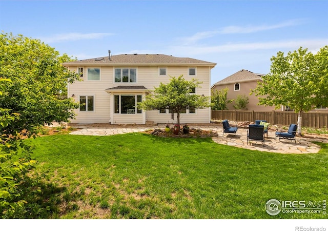 5751 Round Rock Ct, Fort Collins, CO 80528 - rear view of property featuring a patio area