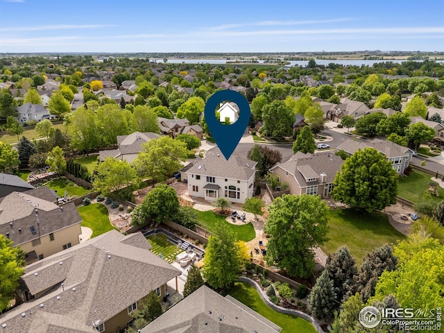 5751 Round Rock Ct, Fort Collins, CO 80528 - aerial perspective of suburban area with a nearby body of water