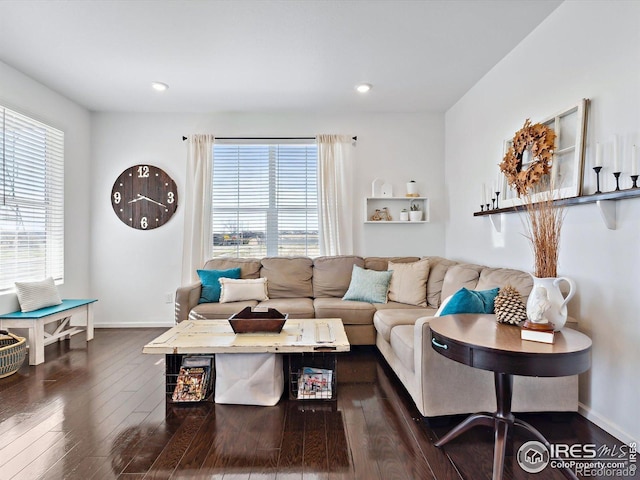 17616 Bluetrail Ave, Parker, CO 80134 - living area with dark wood finished floors and recessed lighting