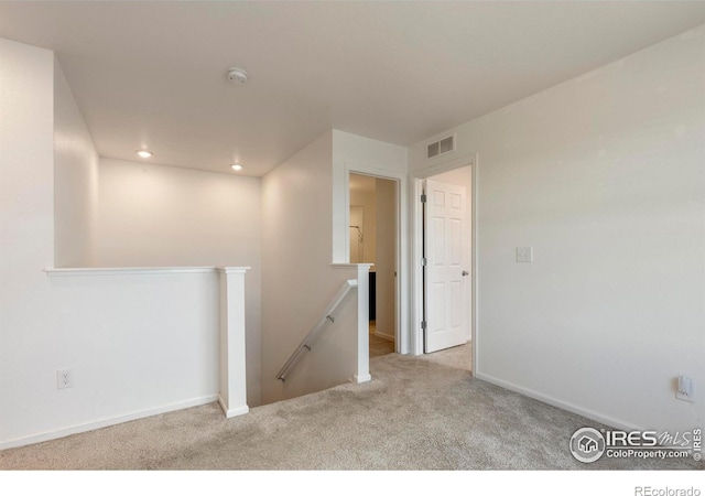 17616 Bluetrail Ave, Parker, CO 80134 - spare room featuring carpet, a smoke detector, and recessed lighting