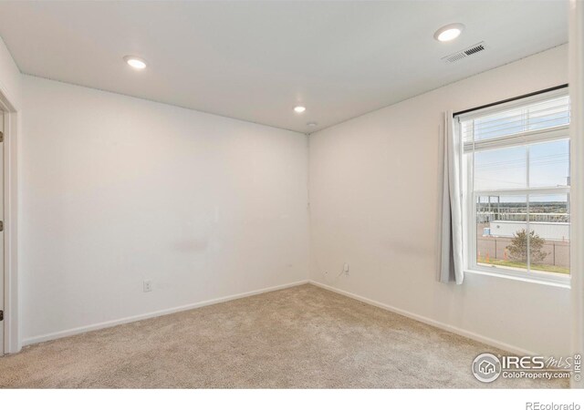 17616 Bluetrail Ave, Parker, CO 80134 - carpeted spare room featuring baseboards and recessed lighting