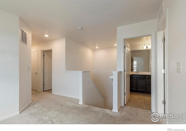 17616 Bluetrail Ave, Parker, CO 80134 - corridor with an upstairs landing, carpet flooring, and recessed lighting