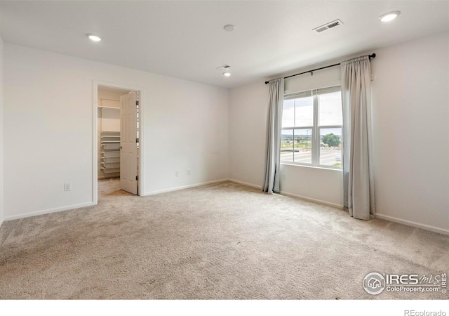 17616 Bluetrail Ave, Parker, CO 80134 - carpeted spare room with baseboards and recessed lighting