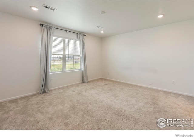 17616 Bluetrail Ave, Parker, CO 80134 - carpeted empty room featuring baseboards and recessed lighting