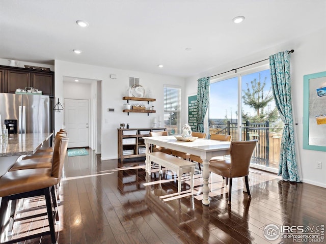 17616 Bluetrail Ave, Parker, CO 80134 - dining room with dark wood finished floors and recessed lighting
