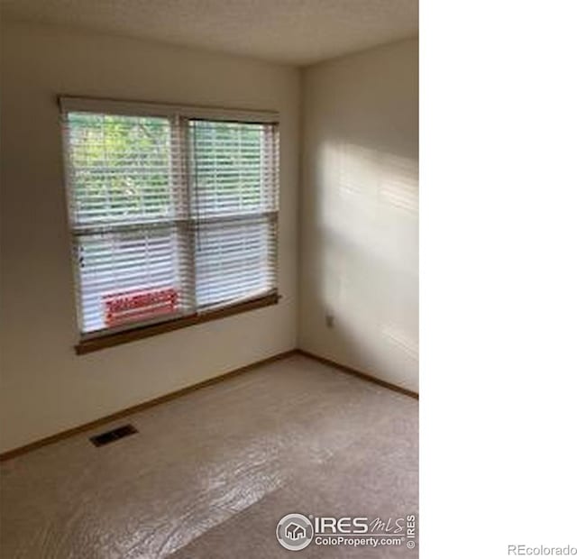 2929 W 81st Ave Unit H, Westminster, CO 80031 - carpeted empty room featuring baseboards