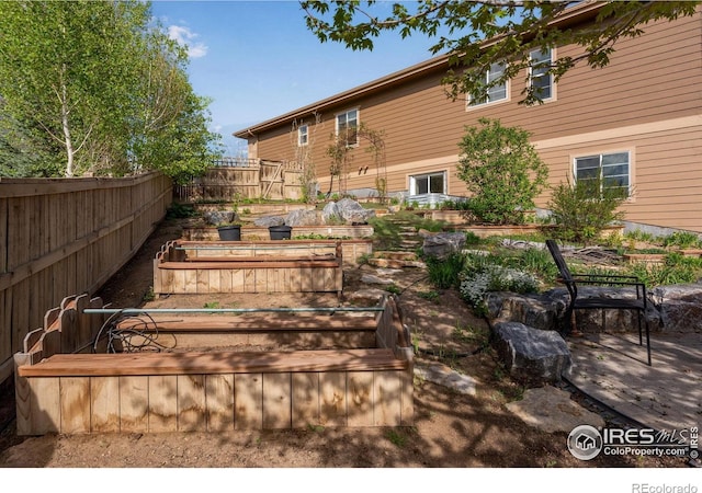 4000 Donnington Cir, Castle Rock, CO 80104 - wooden deck featuring a garden