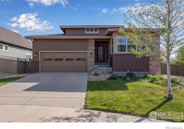 4000 Donnington Cir, Castle Rock, CO 80104 - view of front facade featuring driveway and a garage