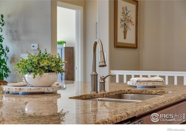 4000 Donnington Cir, Castle Rock, CO 80104 - kitchen view of a sink and light stone countertops