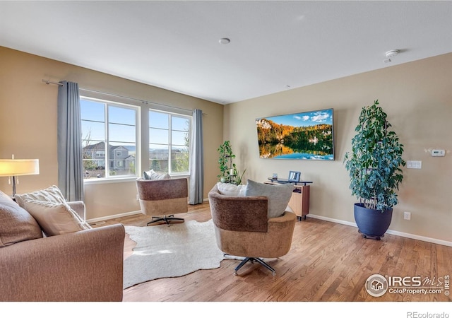 4000 Donnington Cir, Castle Rock, CO 80104 - living area with wood finished floors and baseboards