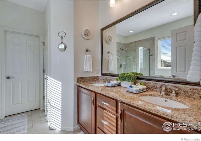 4000 Donnington Cir, Castle Rock, CO 80104 - bathroom with a stall shower, double vanity, and tile patterned floors