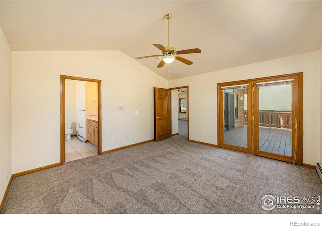 683 Cedar Ridge Cir, Estes Park, CO 80517 - unfurnished bedroom featuring access to outside, carpet, lofted ceiling, baseboards, and ensuite bathroom