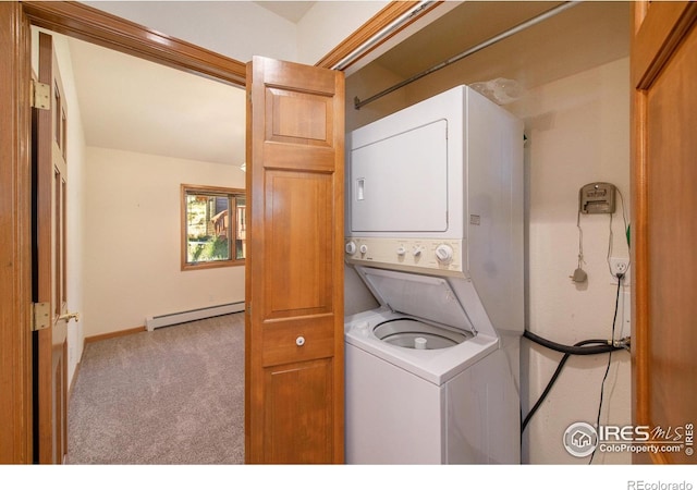 683 Cedar Ridge Cir, Estes Park, CO 80517 - washroom featuring stacked washer and clothes dryer, a baseboard radiator, carpet, and baseboards