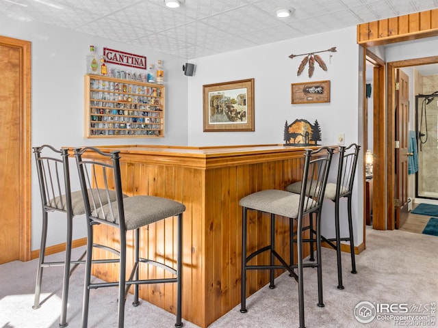 3807 Dollar Lake Dr, Estes Park, CO 80517 - indoor dry bar featuring carpet floors and baseboards