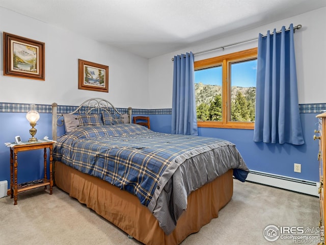 3807 Dollar Lake Dr, Estes Park, CO 80517 - bedroom with a baseboard heating unit, carpet flooring, and baseboards