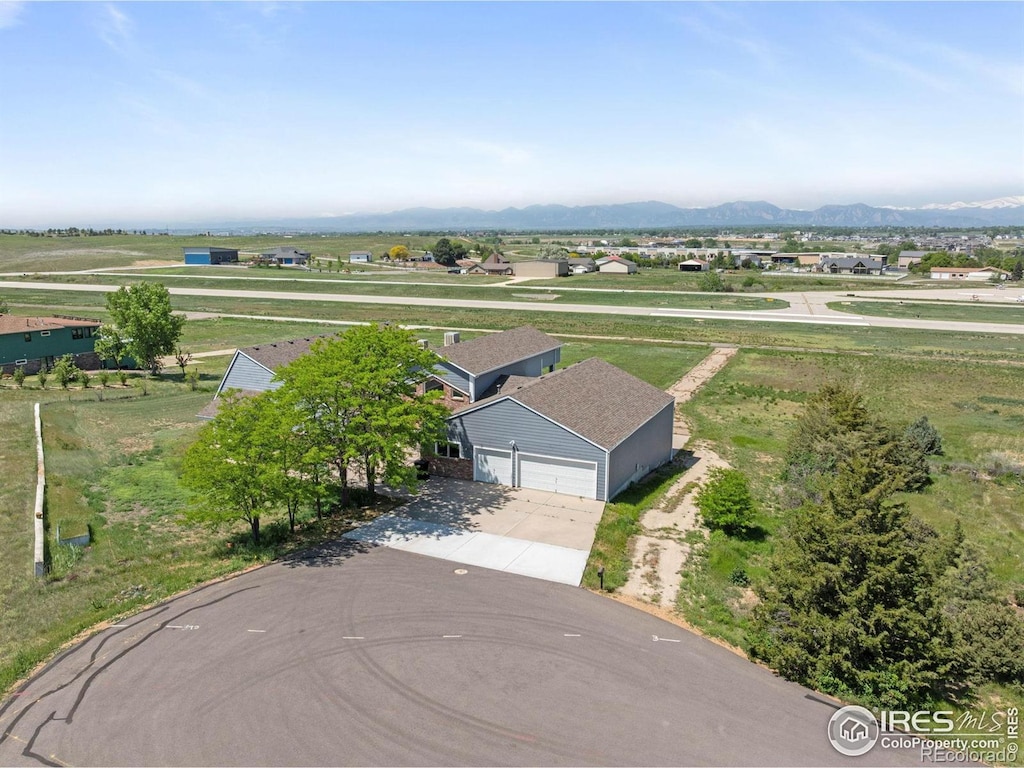 2875 Mooney Pl, Erie, CO 80516 - aerial view of property and surrounding area with a mountainous background