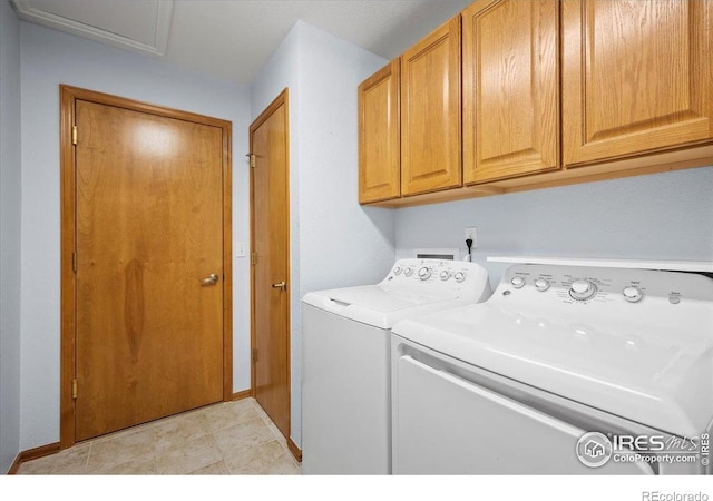 1528 16th Pl, Longmont, CO 80501 - laundry area featuring cabinet space, independent washer and dryer, and baseboards